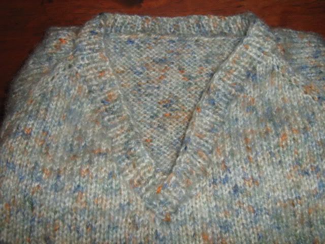 Fluffy blue sweater neck detail