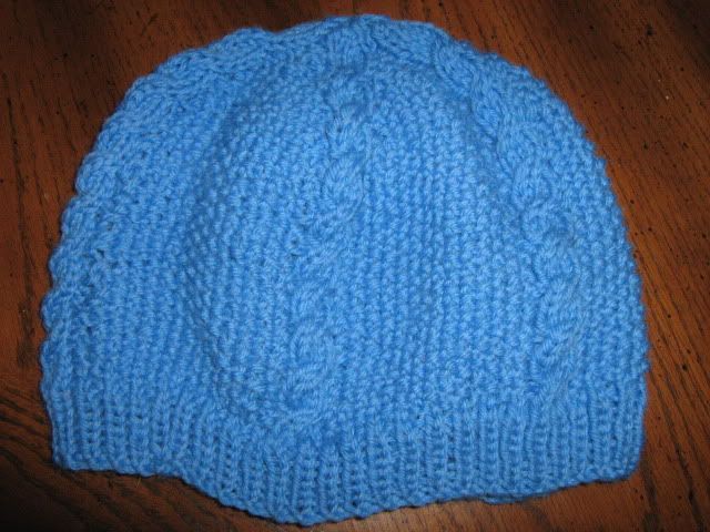 Blue seed and cable hat