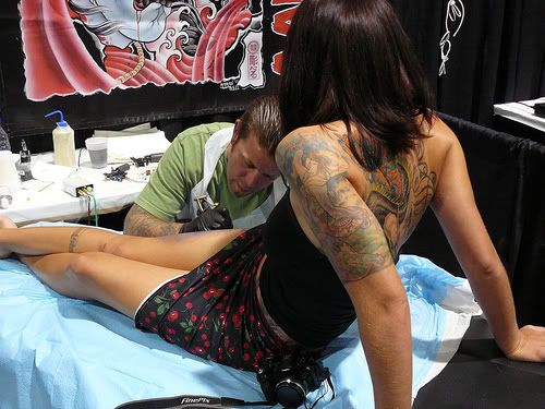 cool tattoos for women. Women Getting Tattoo On The