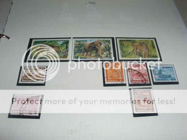 Bangladesh and Bhutan collection in album. All stamps shown in the 48 